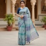 Ethereal Sea-Mist Linen Saree with Contemporary Floral Accents