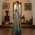 Timeless Elegance: Silver-Grey Kanchipuram Silk Saree with Teal Zari Borders - Image 2